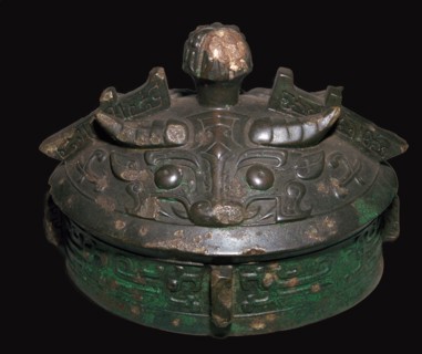 Chinese bronze lid of a wine-vessel, 11th century BC.h Artist: Unknown