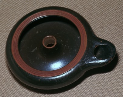 Greek clay lamp made in Athens, 5th century BC. Artist: Unknown
