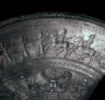 Detail of a Phoenician silver bowl showing soldiers attacking a city, 7th century BC. Artist: Unknown