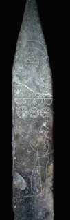 Punic stela of a priest holding a child. Artist: Unknown