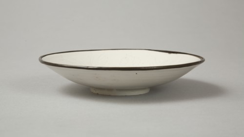 Small Ding-type bowl with incised peony scroll and dragon, 20th century. Artist: Unknown.