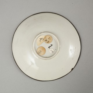 Small Ding-type bowl with incised peony scroll and dragon, 20th century. Artist: Unknown.