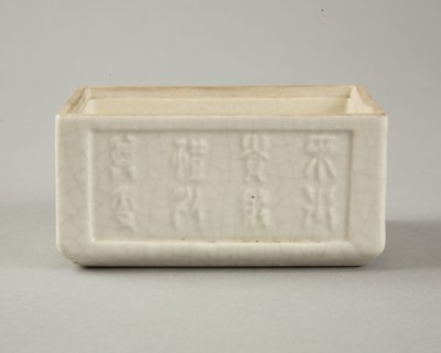 Soft paste rectangular vessel with characters in relief, early 19th century. Artist: Unknown.