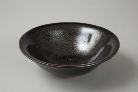 A 20th century copy of buff-bodied Cizhou-type bowl with oil spot glaze, 20th century. Artist: Unknown.