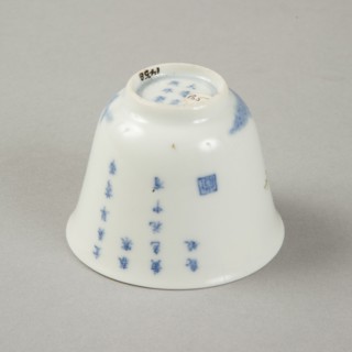 Underglaze blue month cup with polychrome enamelled decoration of a prunus tree. Artist: Unknown.