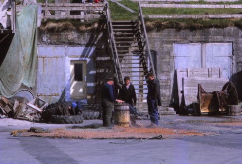 Fishermen in Husavik, Iceland, 20th century. Artist: CM Dixon.