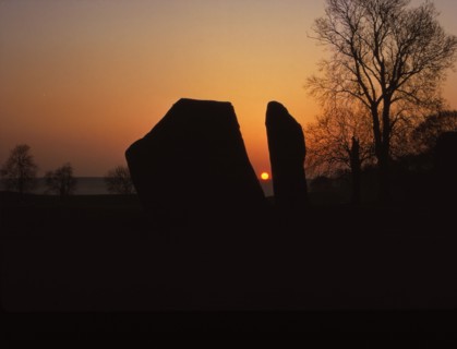 Sunrise on Megalithic Circle, Avebury, Wiltshire, 20th century. Artist: CM Dixon.
