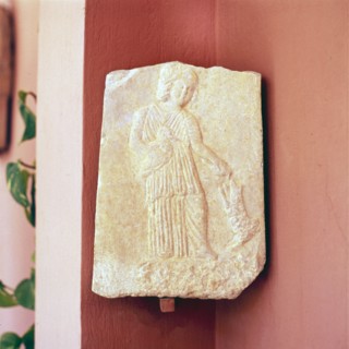 Greek Funerary Relie, Young girl with Bird and Dog, 4th century BC. Artist: Unknown.