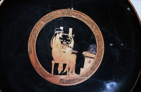 Detail of Greek red-Figured Kylix, Apollo seated at altar, with Kithara, Athens, c480BC-47 BC. Artist: Unknown.