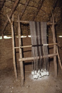 Loom with chalk loom weights, Butser Iron Age Farm, c20th century. Artist: CM Dixon.