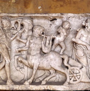 Centaurs pulling a cart  Artist: Unknown.