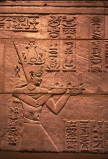 Egyptian relief of Emperor Augustus (Roman) as Pharaoh, offering to Isis, c1st century. Artist: Unknown.