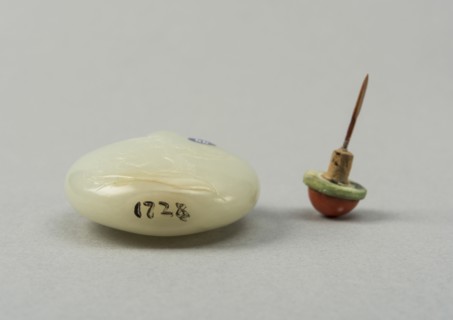 Jade snuff bottle with plum tree and characters on reverse, China, Qing dynasty, 1644-1911. Creator: Unknown.
