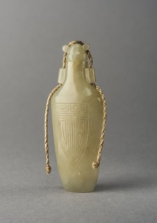 Pale Green jade snuff bottle with incised decoration, China, Qing dynasty, 1644-1911. Creator: Unknown.