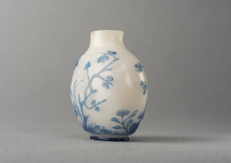 White glass snuff bottle with blue overlay, China, Qing dynasty, 1644-1911. Creator: Unknown.