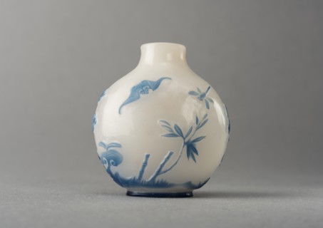 White glass snuff bottle with blue overlay, China, Qing dynasty, 1644-1911. Creator: Unknown.