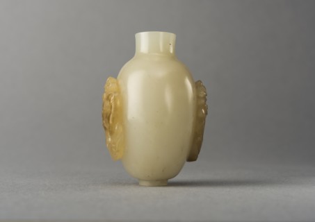 Jade snuff bottle with raised carving of animals, China, Qing dynasty, 1644-1911. Creator: Unknown.