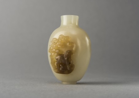 Jade snuff bottle with raised carving of animals, China, Qing dynasty, 1644-1911. Creator: Unknown.