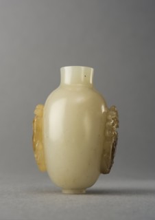 Jade snuff bottle with raised carving of animals, China, Qing dynasty, 1644-1911. Creator: Unknown.