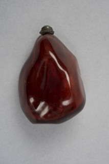 Amber snuff bottle of natural pebble form, China, Qing dynasty, 1644-1911. Creator: Unknown.