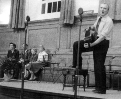 Bob Roberts playing the melodion, Cecil Sharp House, London, October 1957. Artist: Eddis Thomas