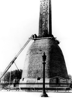 Sandbags protecting the base of the Egyptian obelisk, German-occupied Paris, 1940. Artist: Unknown