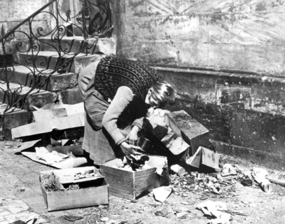 Woman scavenging for food, Bayreuth, Germany, April 1945. Artist: Unknown