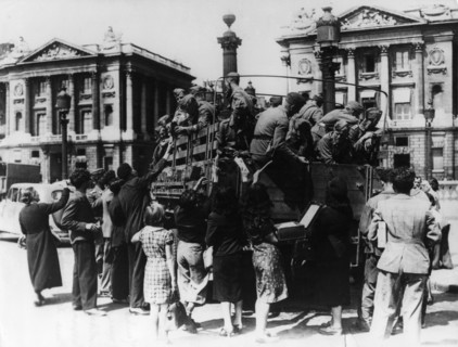 French street sellers offering souvenirs to a truckload of German soldiers, Paris, 27 July 1940. Artist: Unknown
