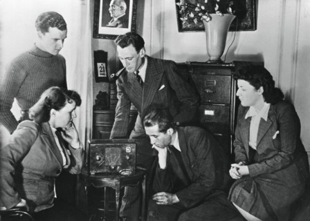 French citizens listening to a broadcast by Vichy deputy premier Admiral Darlan, 23 May, 1941. Artist: Unknown