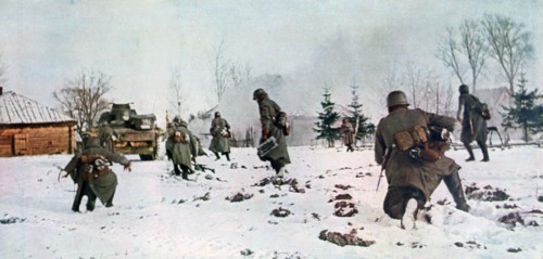 German infantrymen following a tank towards Moscow in the snow, Russia, 1941. Artist: Unknown