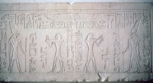 Lintel of Senusret III depicting the Pharaoh making offerings to the God Montu, 12th Dynasty. Artist: Unknown