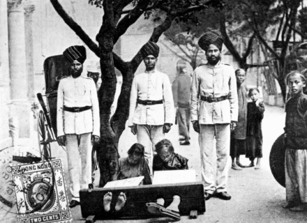 Children in the stocks, Hong Kong, 1908. Artist: Unknown