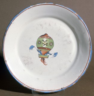 A French faience plate with aeronauts with flags, 1785. Artist: Unknown