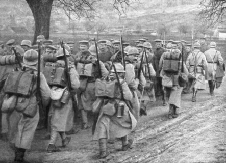 Relief French infantry passing a line of prisoners, Plessis-de-Roye, Picardy, France, 30 March 1918. Artist: Unknown