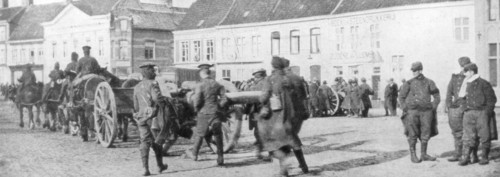 British horse-drawn artillery in a Belgian village, August 1914. Artist: Unknown