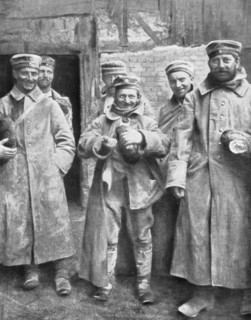German prisoners of war with their ration of bread, 1915. Artist: Unknown