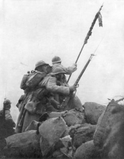 French troops with their regimental flag, the 2nd Battle of Champagne, France, 25 September 1915. Artist: Unknown