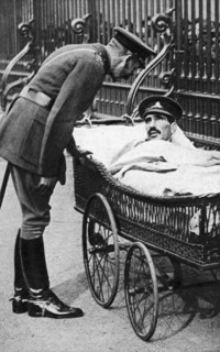 George V with a wounded soldier, 7th Battalion Sherwood Foresters, March 1918. Artist: Unknown