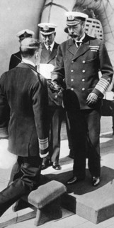 King George V knights Vice-Admiral Pakenham aboard HMS Princess Royal, c1930s. Artist: Unknown