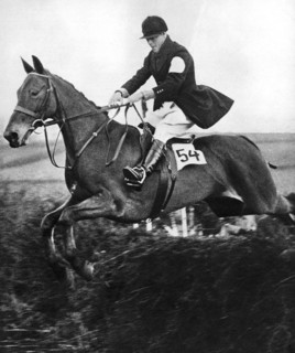 The Prince of Wales taking a fence in the bridge of Guards Challenge Cup race, c1930s. Artist: Unknown