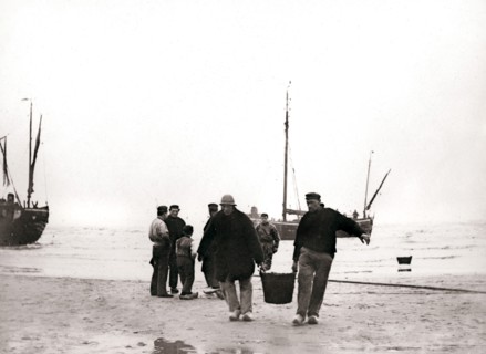 Men on the shore, Scheveningen, Netherlands, 1898.Artist: James Batkin