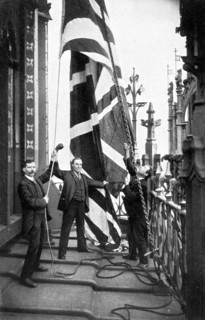Hoisting the Union Jack, Houses of Parliament, Westminster, c1905. Artist: Unknown