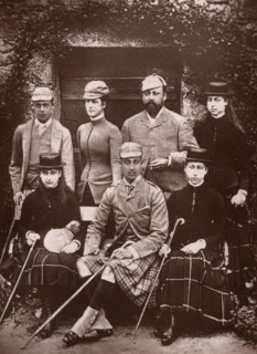 The Prince and Princess of Wales in shooting dress, 1900.Artist: Russell & Sons