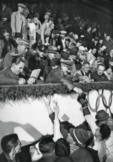 Adolf Hitler signs autographs, Winter Olympic Games, Garmisch-Partenkirchen, Germany, 1936.Artist: Schirner