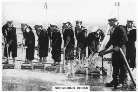 Scrubbing the deck on board HMS 'Nelson', 1937. Artist: Unknown