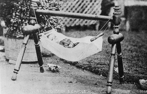 Hindu baby and cradle, India, 20th century. Artist: Unknown