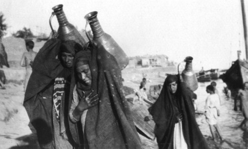 Female water carriers, Amarah, Iraq, 1917-1919. Artist: Unknown