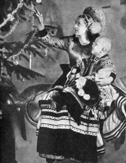 Mother and child with Christmas tree, Matyo people, Miskole, Hungary, 1936. Artist: Unknown