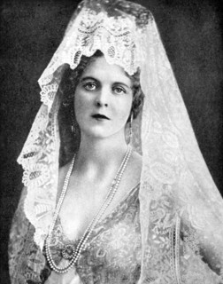 Woman wearing a lace mantilla, Andalusia, Spain, 1936. Artist: Fox