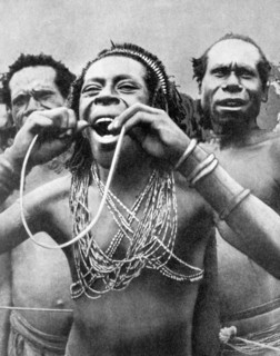 Swallowing canes in a ceremonial ritual, New Guinea, 1936.Artist: Wide World Photos